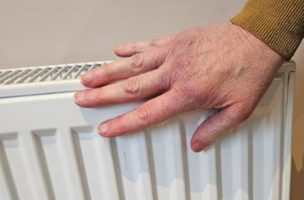 Hand on radiator